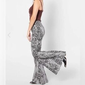 WE THE FREE | Gray Snakeskin Print Ultra High Rise Flared Pants | Free People